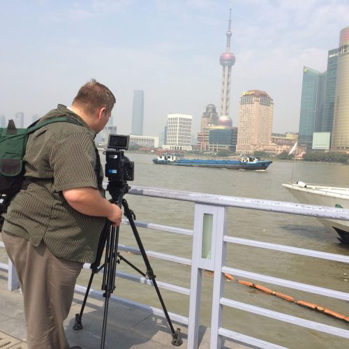 Ian filming across from the Bund Shanghai, China-1773965290