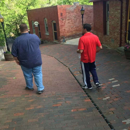 Author Lance Hoovestal standing with his friend